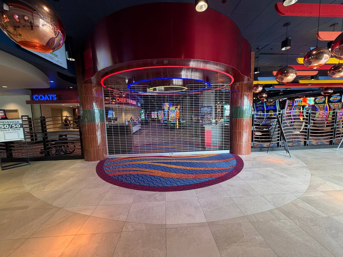 Red Shores Casino, carpet inlay and porcelain tile at the gaming floor entrance