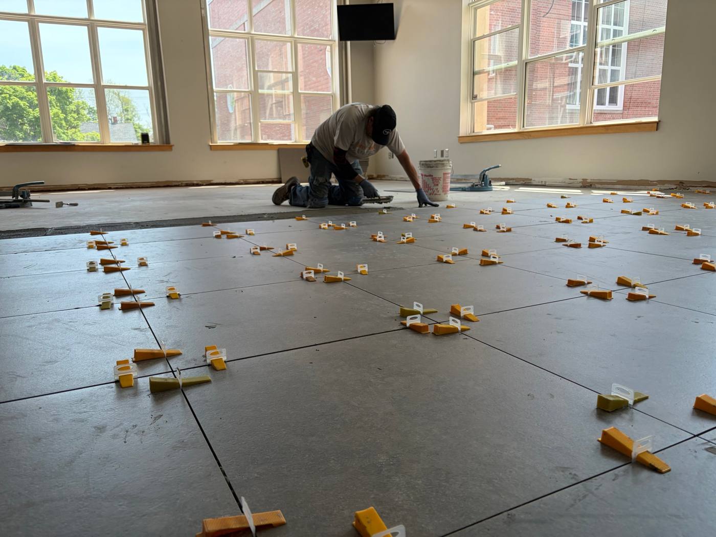 Holland College Upgrades, large-format porcelain with levelling clips