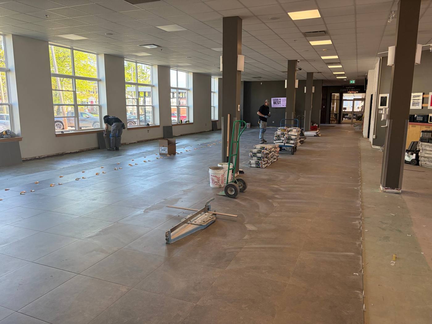 Holland College Upgrades, open floor area in large-format porcelain