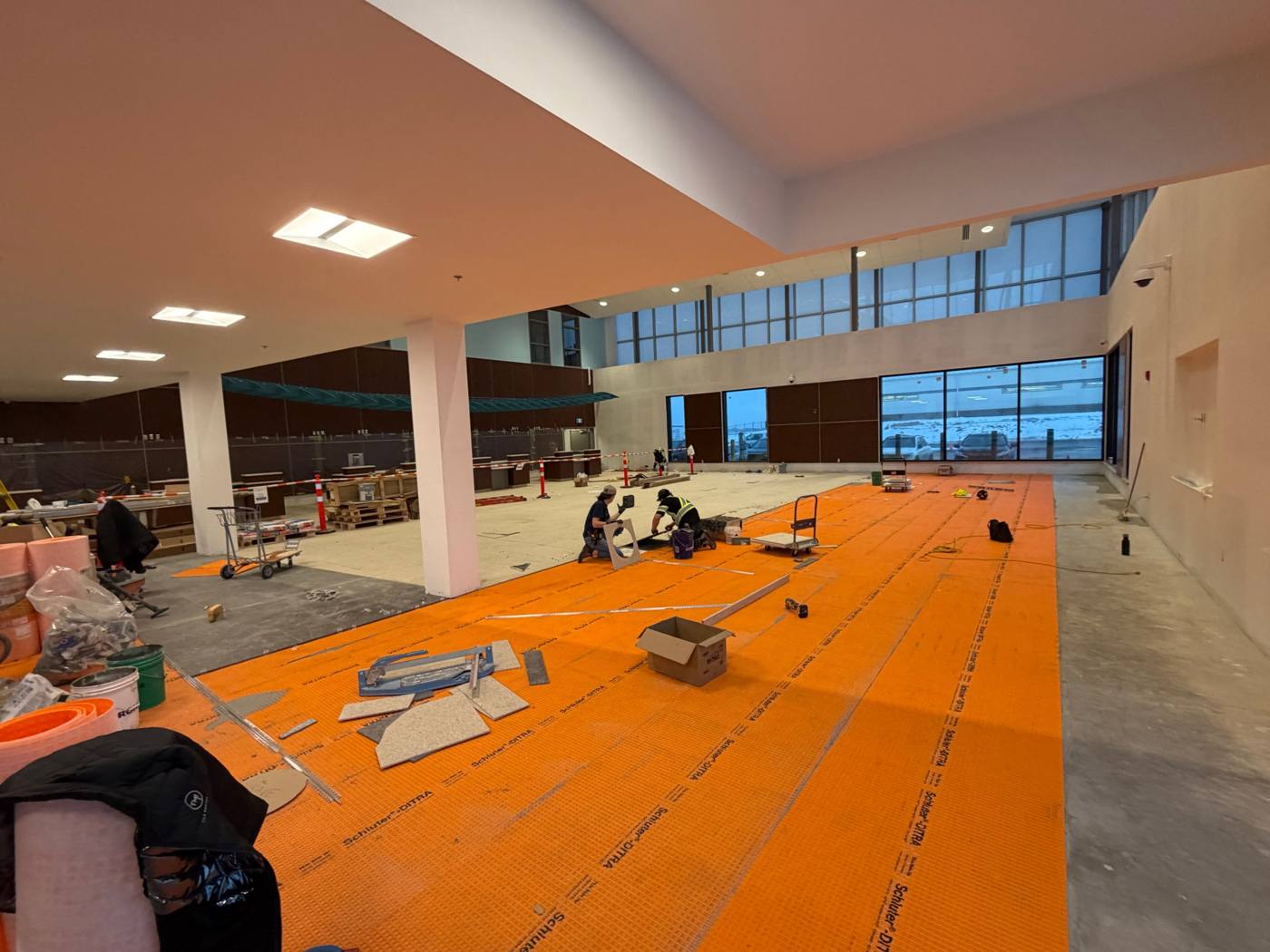 Charlottetown Airport Phase 2, uncoupling membrane going down before tile