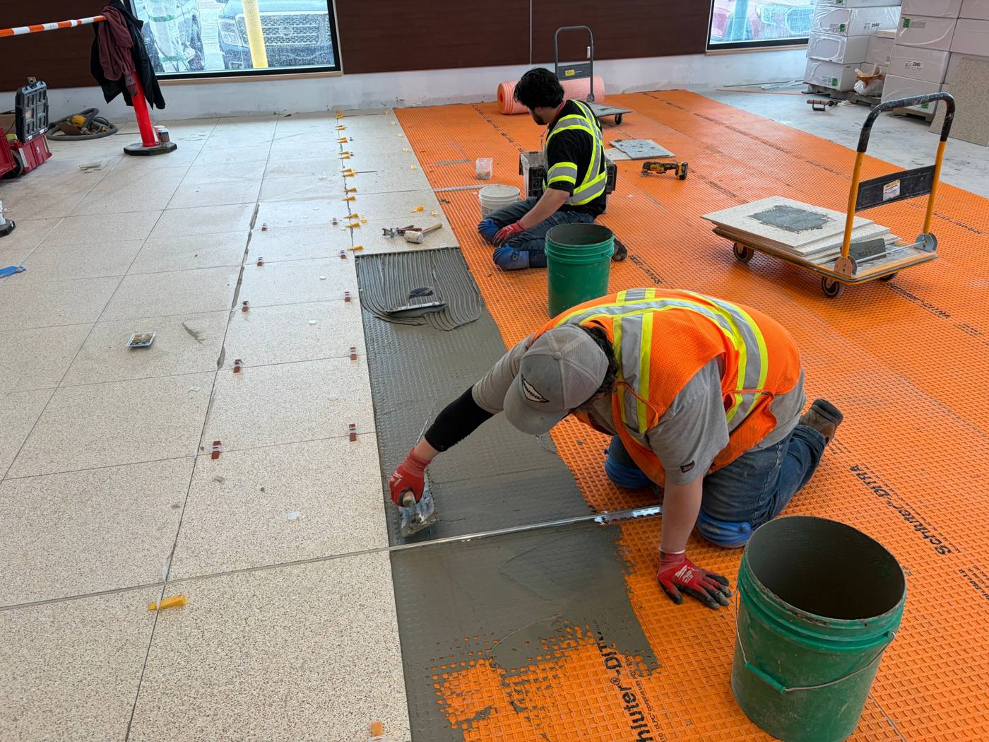 Charlottetown Airport Phase 2, setting porcelain over uncoupling membrane