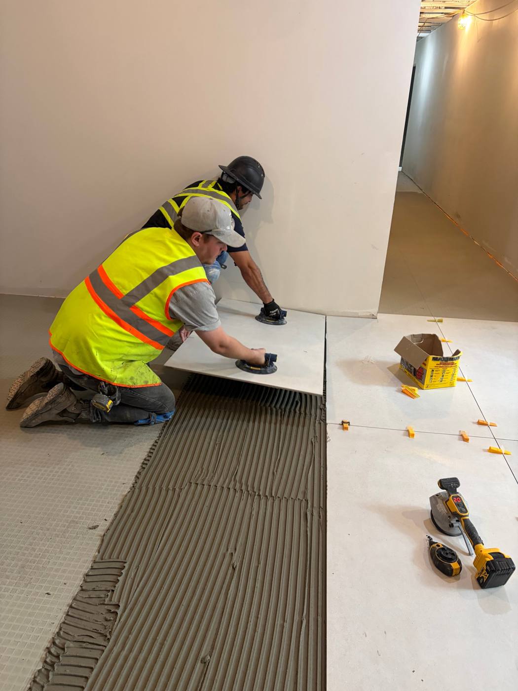 Daniel J. MacDonald Building, setting large-format tile