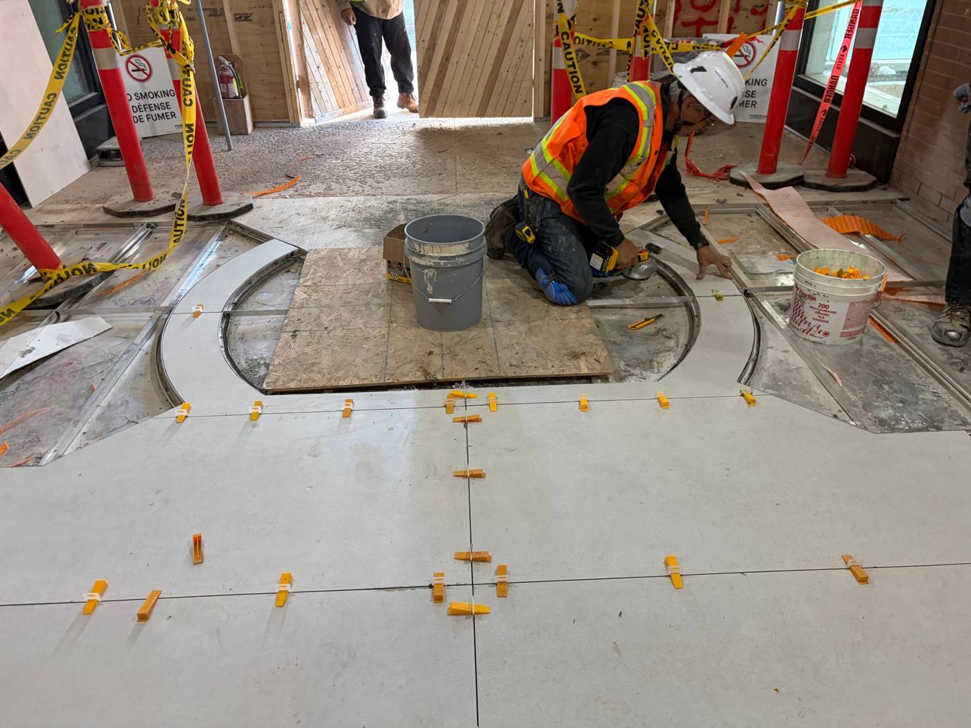 Daniel J. MacDonald Building, porcelain tile around a curved entry detail